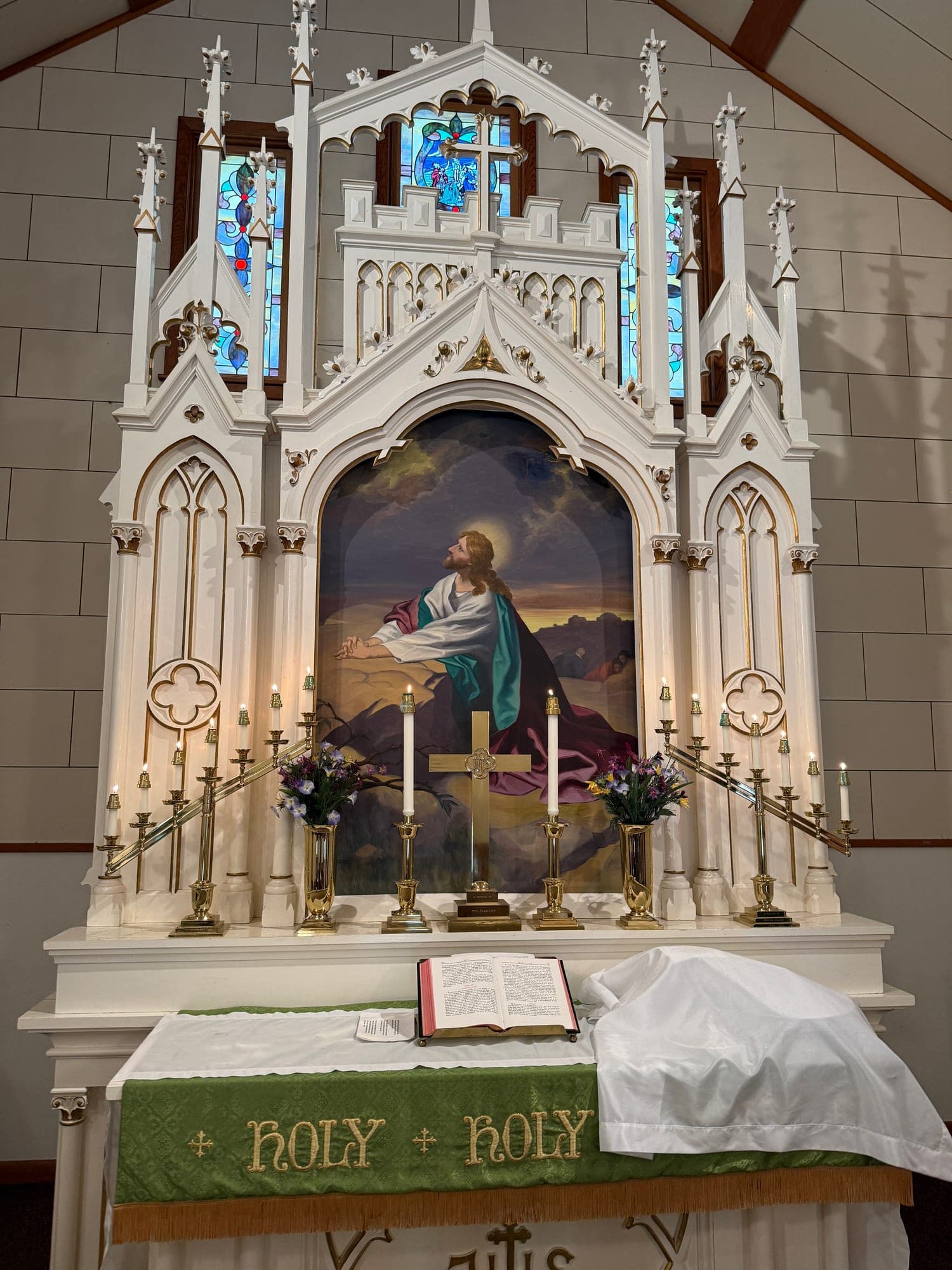 The white Gothic altar of Calvary Lutheran Church
